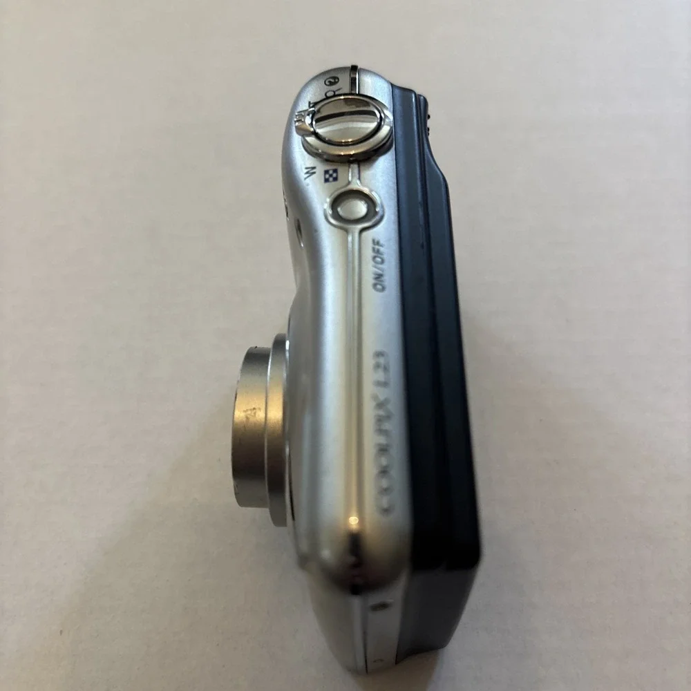 Nikon CoolPix L23‎ 10.1MP Silver Digital Camera - Parts Only